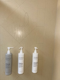 Hair on the shower wall above soap!