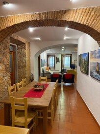 Dining room through to comfy lounge are