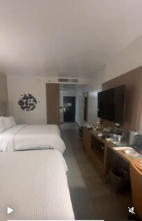 Room is big and spacious. Also has two comfortable chairs, desk and bed lamps; and security box. Also your key has access ONLY to your room floor which I do love that extra security.