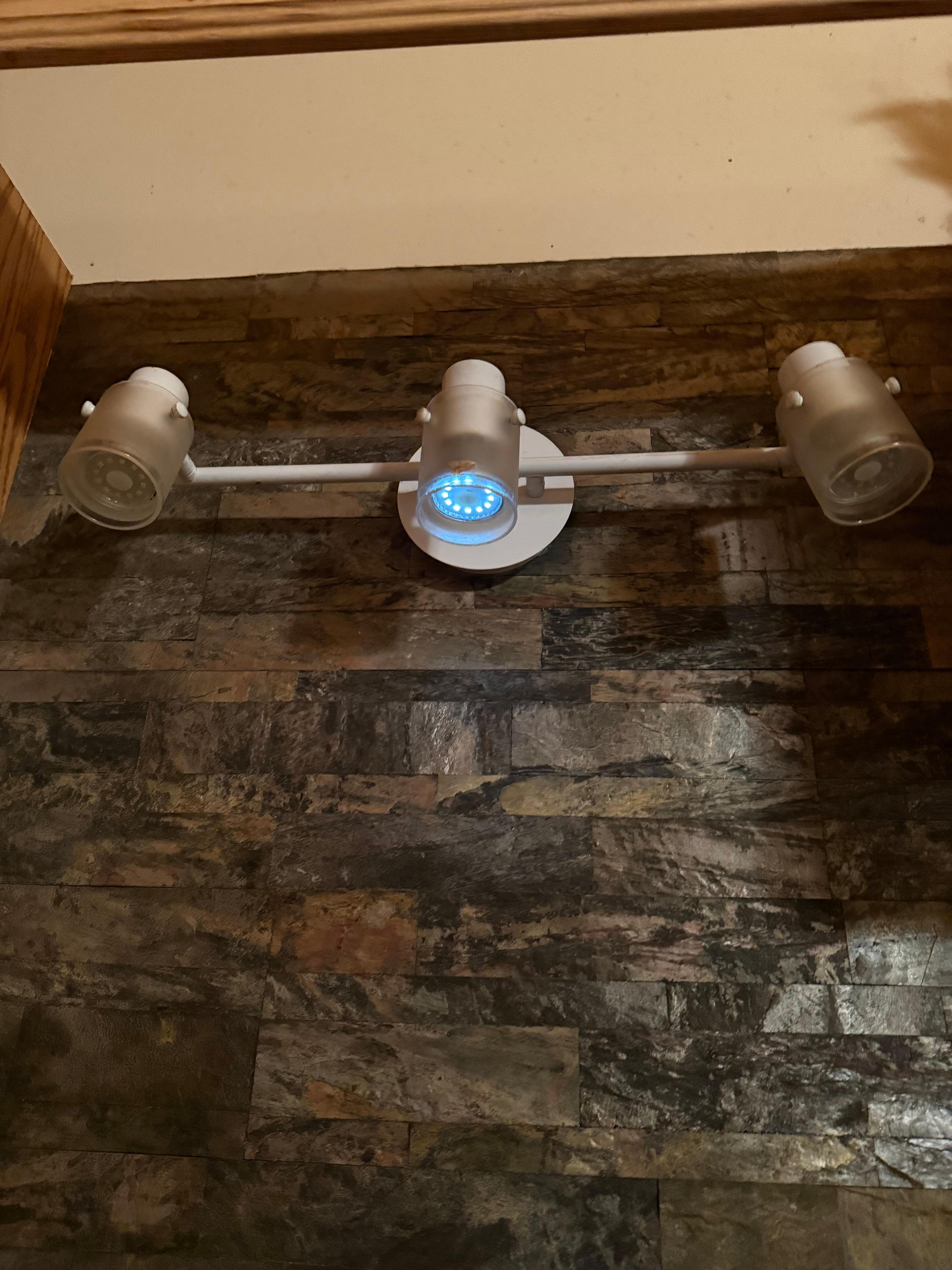 The light over the stove was burnt out and only the middle light barely worked but not to light anything