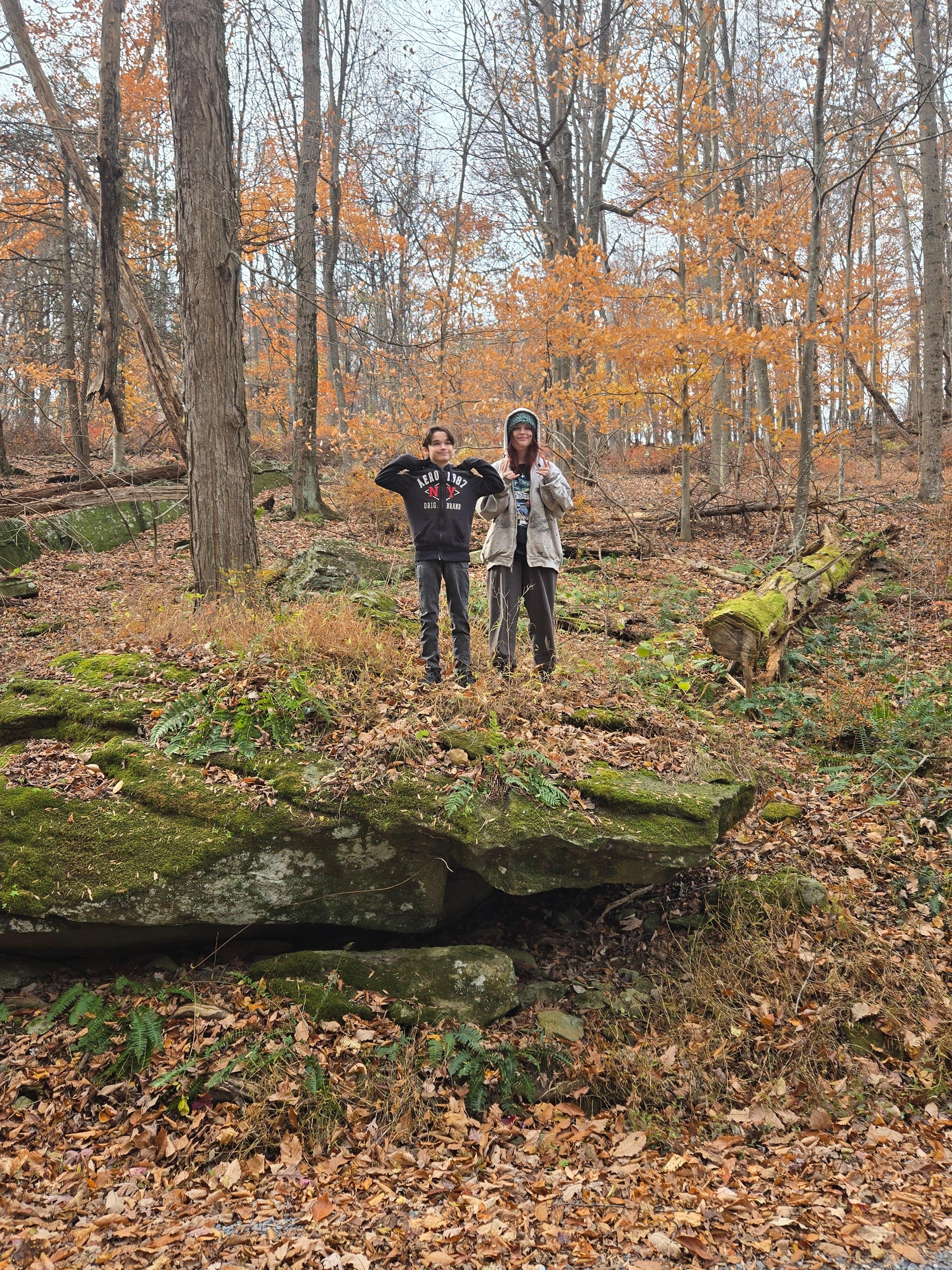 Joslynn n Giovanni exploring on the big rock