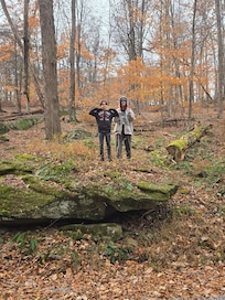 Joslynn n Giovanni exploring on the big rock
