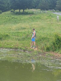 Fish pond a bit weedy for swimming. But free fishing all day.  Fish were small but plentiful and the horses always came out to visit.