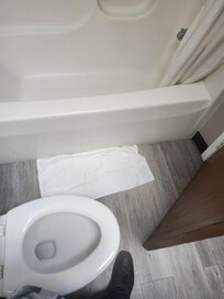 dirty towels on floor