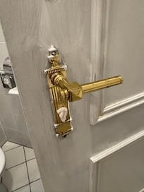 Door doesn't shut and has toilet paper shoved to hide the keyhole