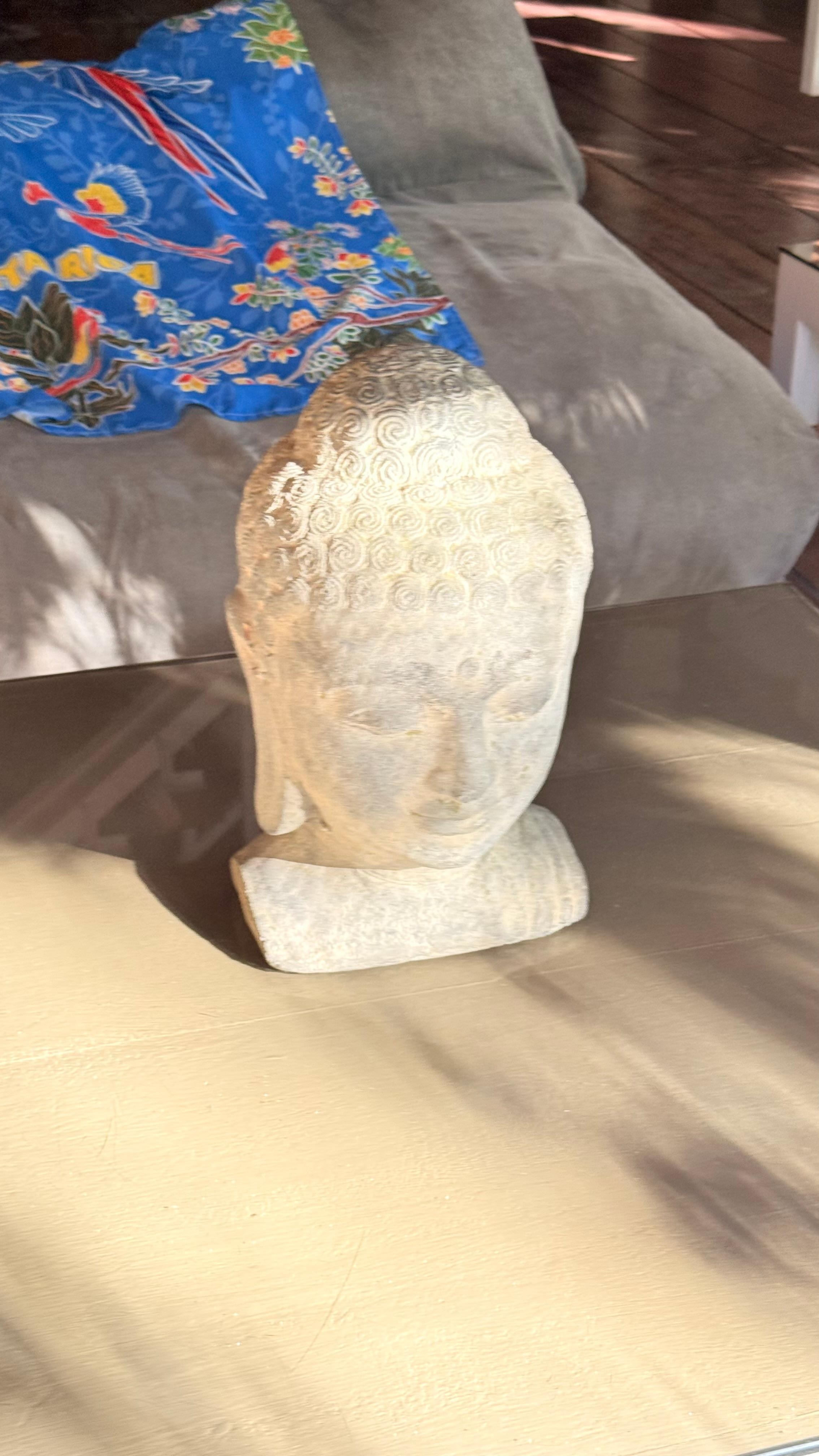 Figure overlooking the pool.