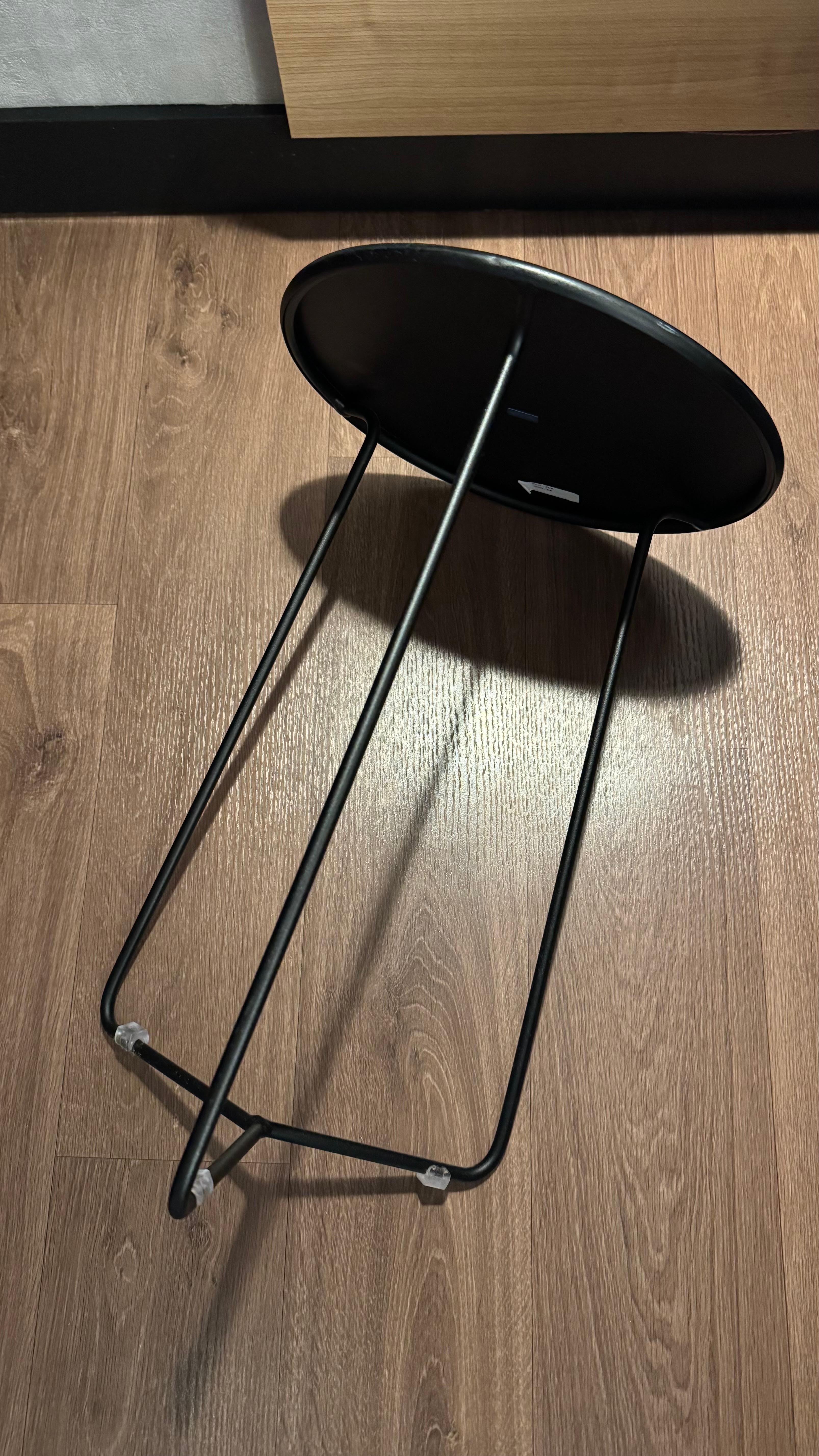 The flimsy 3 legs nightstand. 