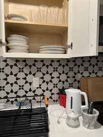 No coffee pot or mugs. Just a tea kettle.