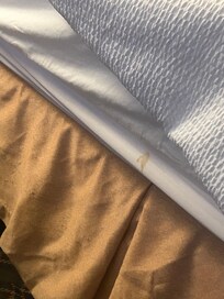 Dirty stained bed sheets