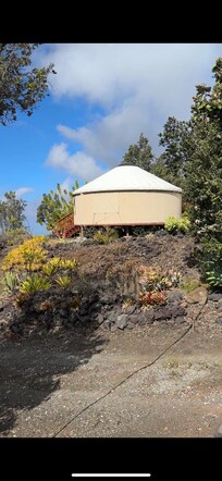 Nearby yurt from the outside.