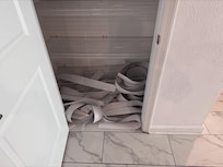 Dirty Broken Blinds thrown into closet.