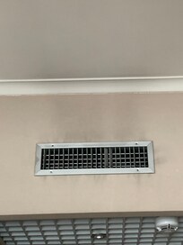 Dirt on ceiling around air vent