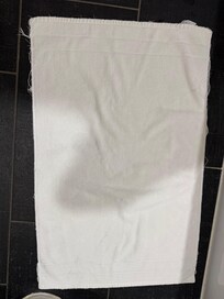 Very old bathroom floor towel