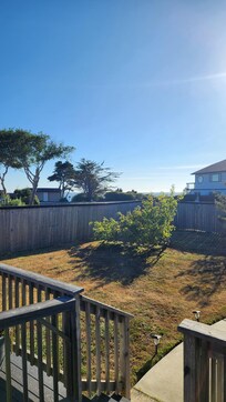 Another view from deck with peek of the ocean.