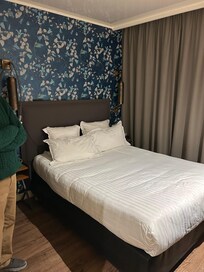 Room not much bigger than the bed but the building is 300 years old.