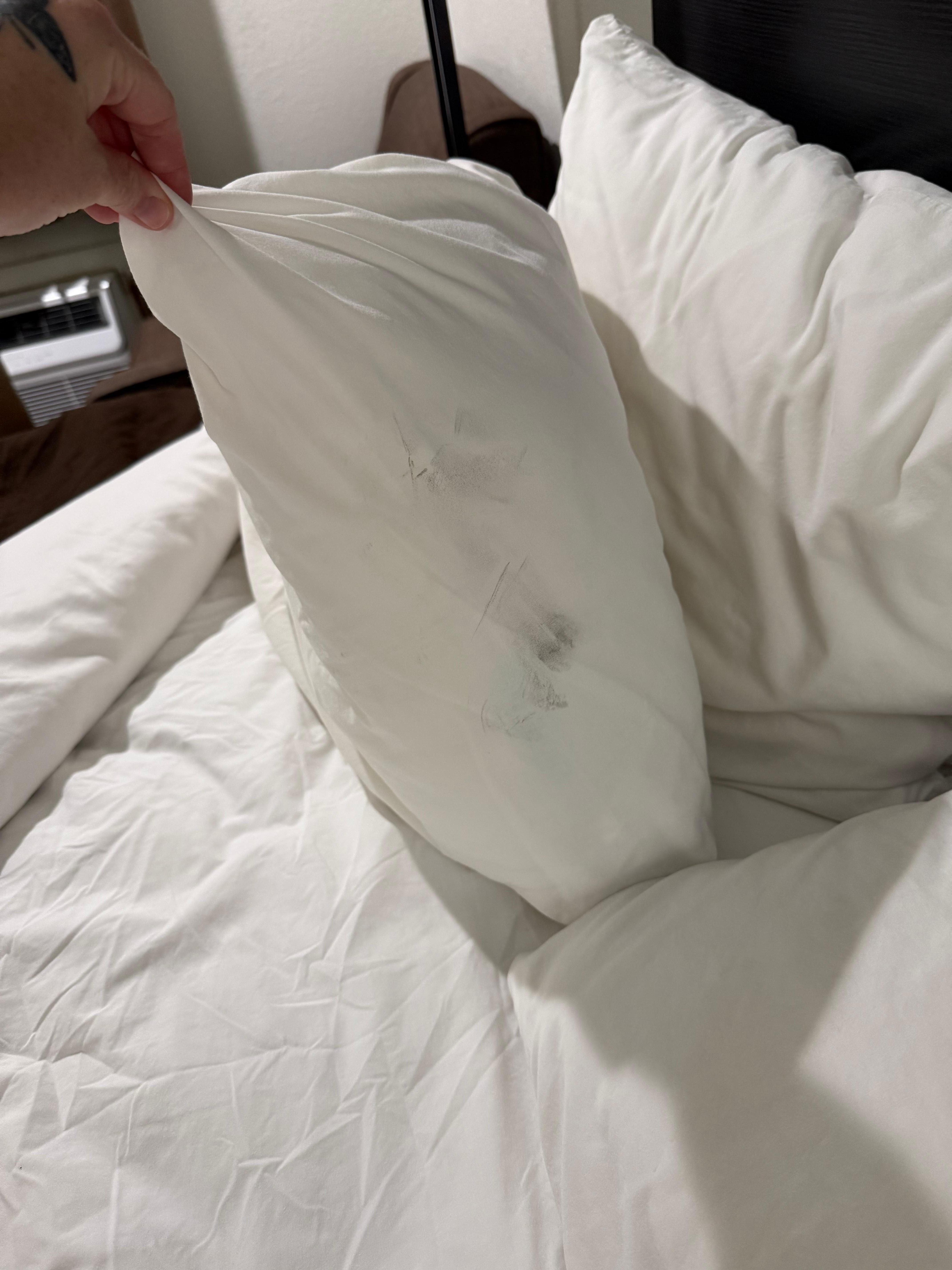 Black substance on pillows