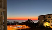 View of sunset from balcony.