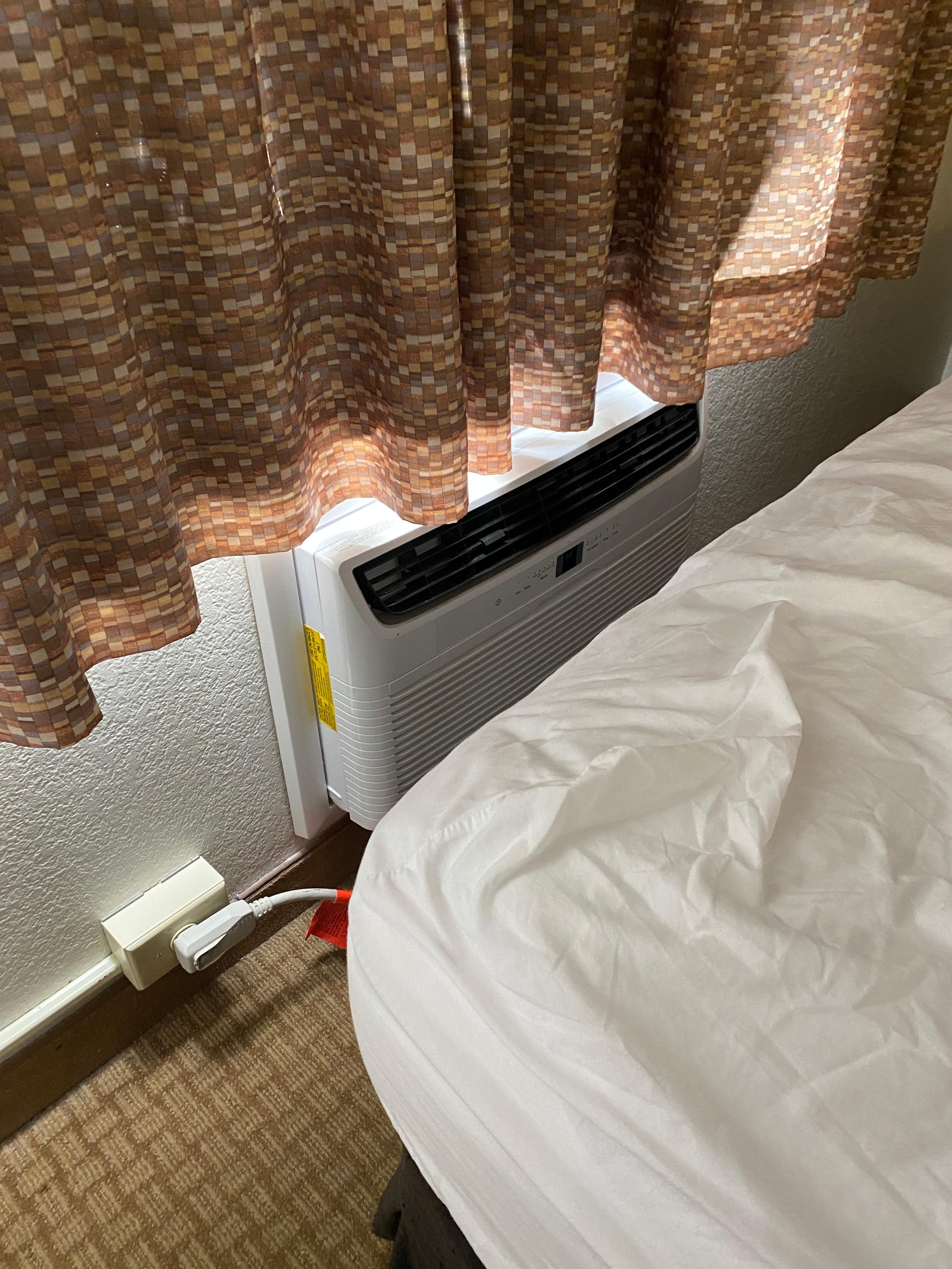 In need of better bed placement for the air to cool the room down properly. Might be the only room like this? 