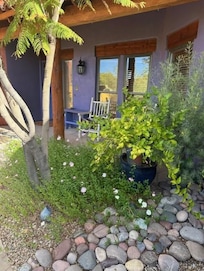 Beautiful front porch. You can hear the live bands from Carefree shopping center from here.