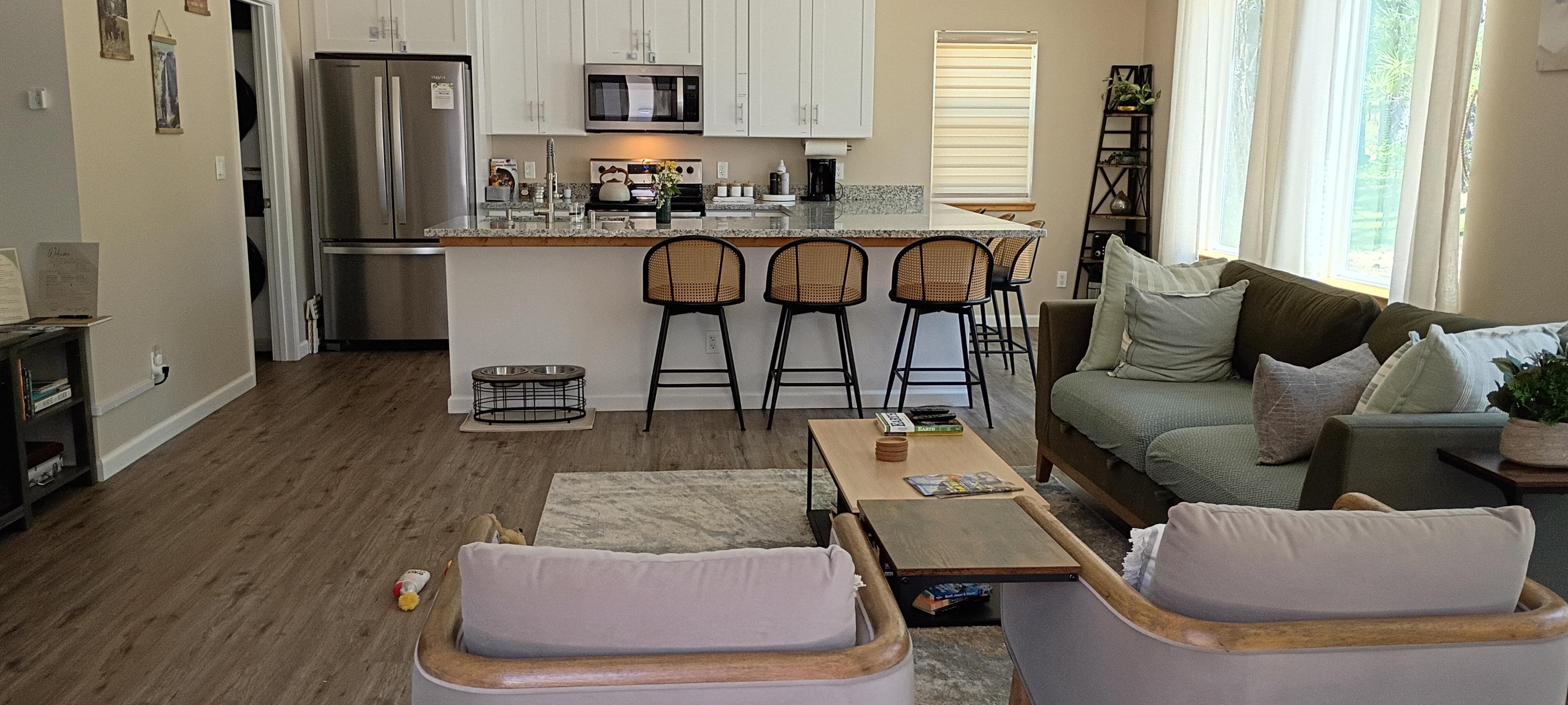 Thelir astounding kitchen and living room combination are nicely designed for a true rest and relaxation time with love ones, including furry family members.The place has so much light around the property.