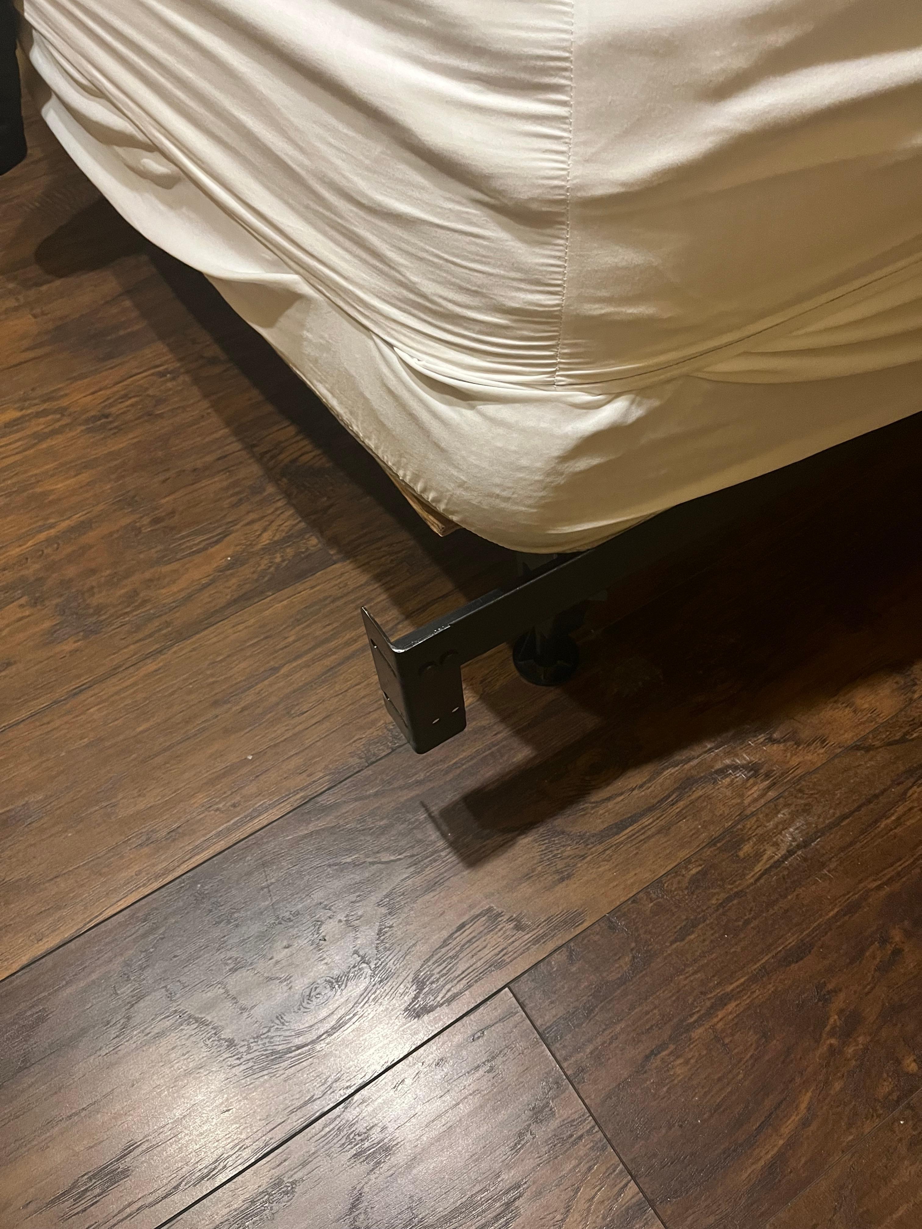 Exposed metal bedframe