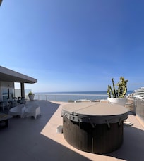 The hot tub controls were locked and the temperature could not be lowered to a comfortable level.