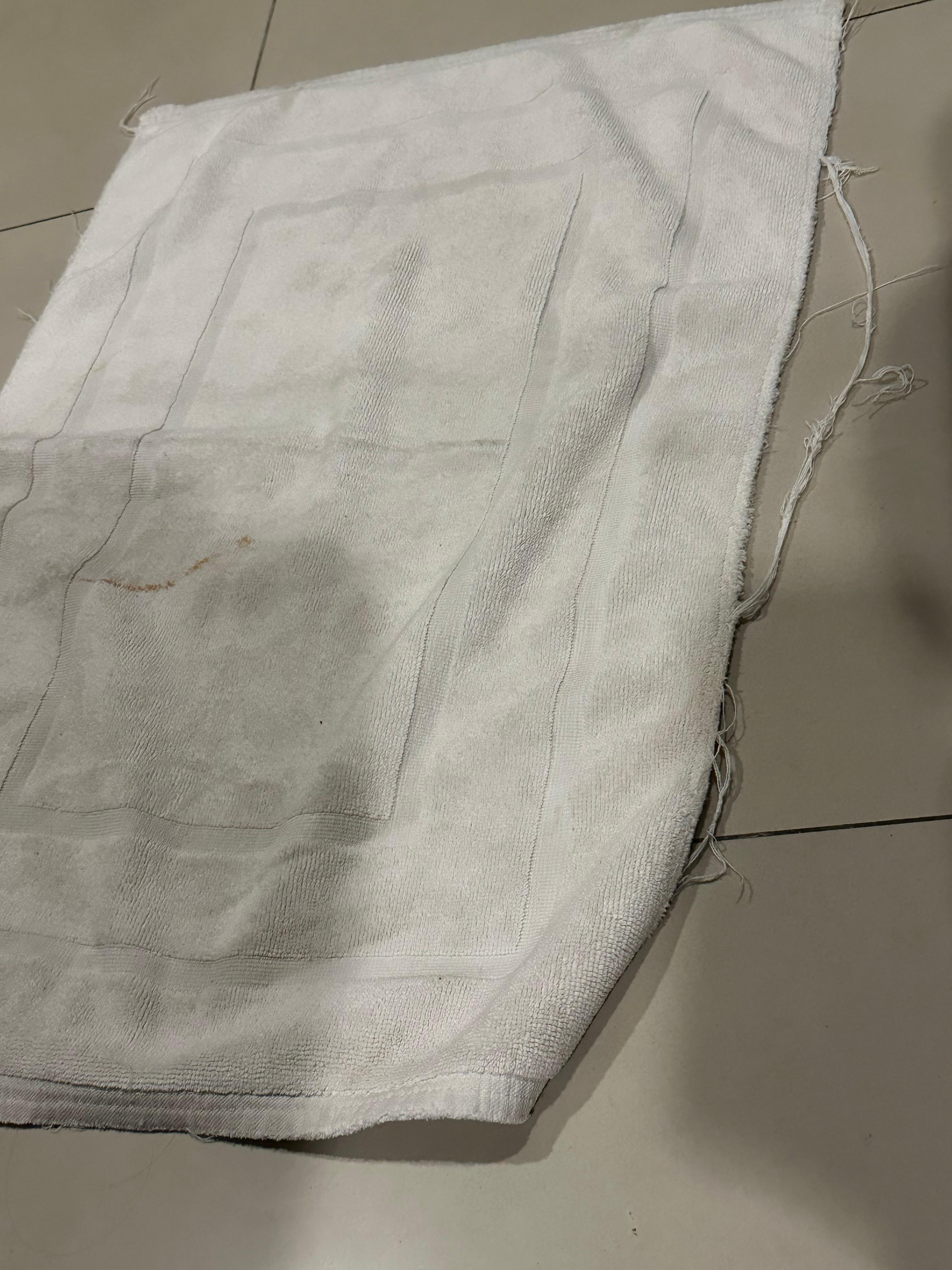 Tatty & old floor towel