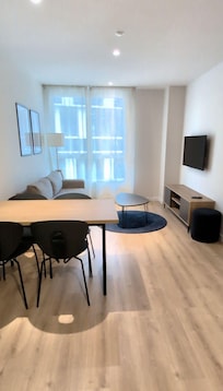 Entrance with kitchen and living room area