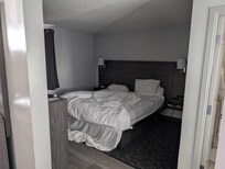 Our bed before we made it up ourselves.