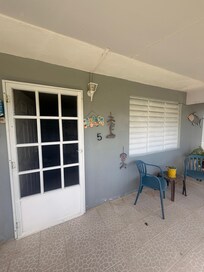 Front porch! Open gate but felt safe parking. No lock on inside but code on outside