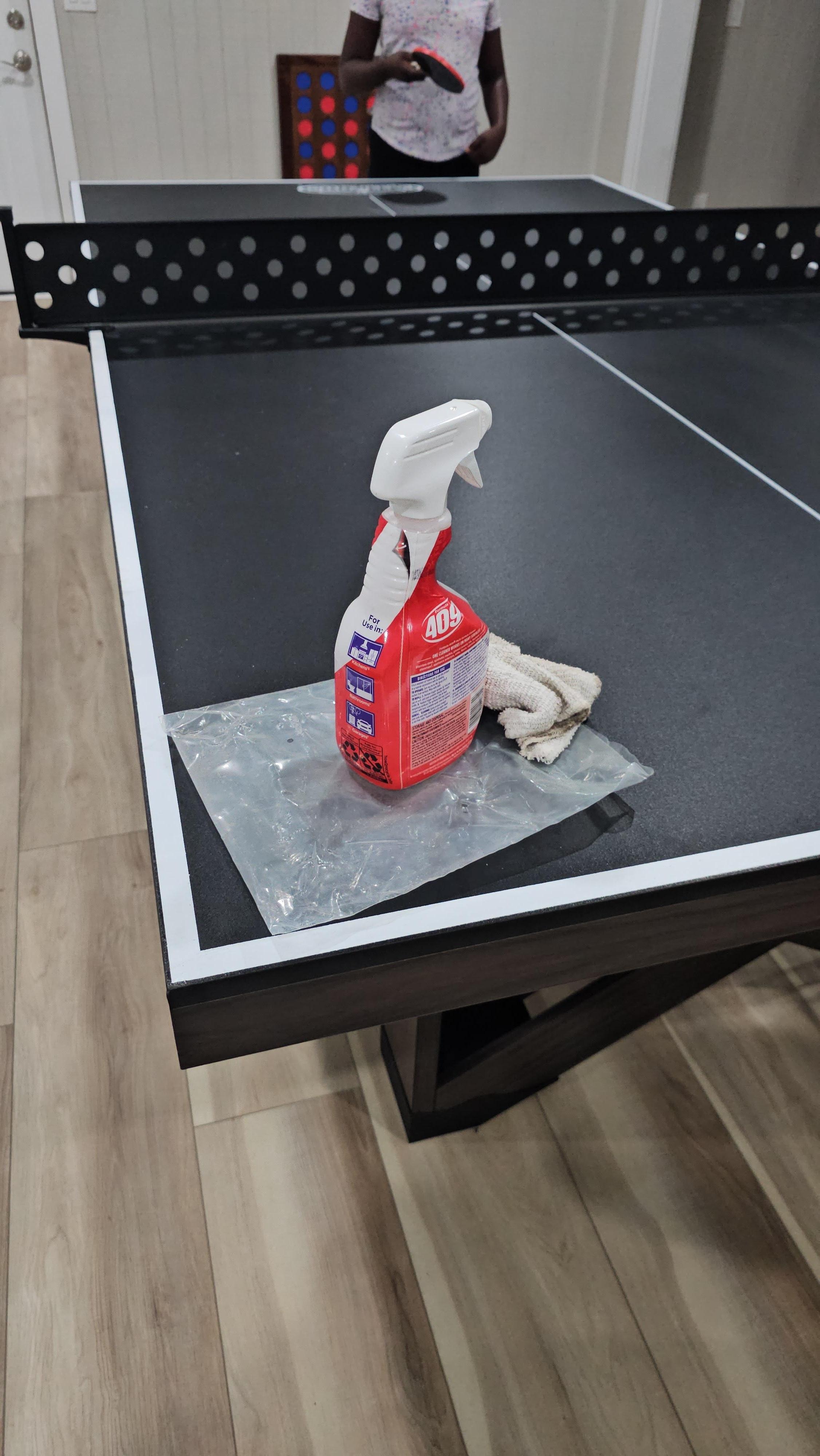Cleaning products and rags just sitting around on the game table when we arrived