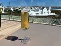 Champagne at The Oyster lounge outside payio
