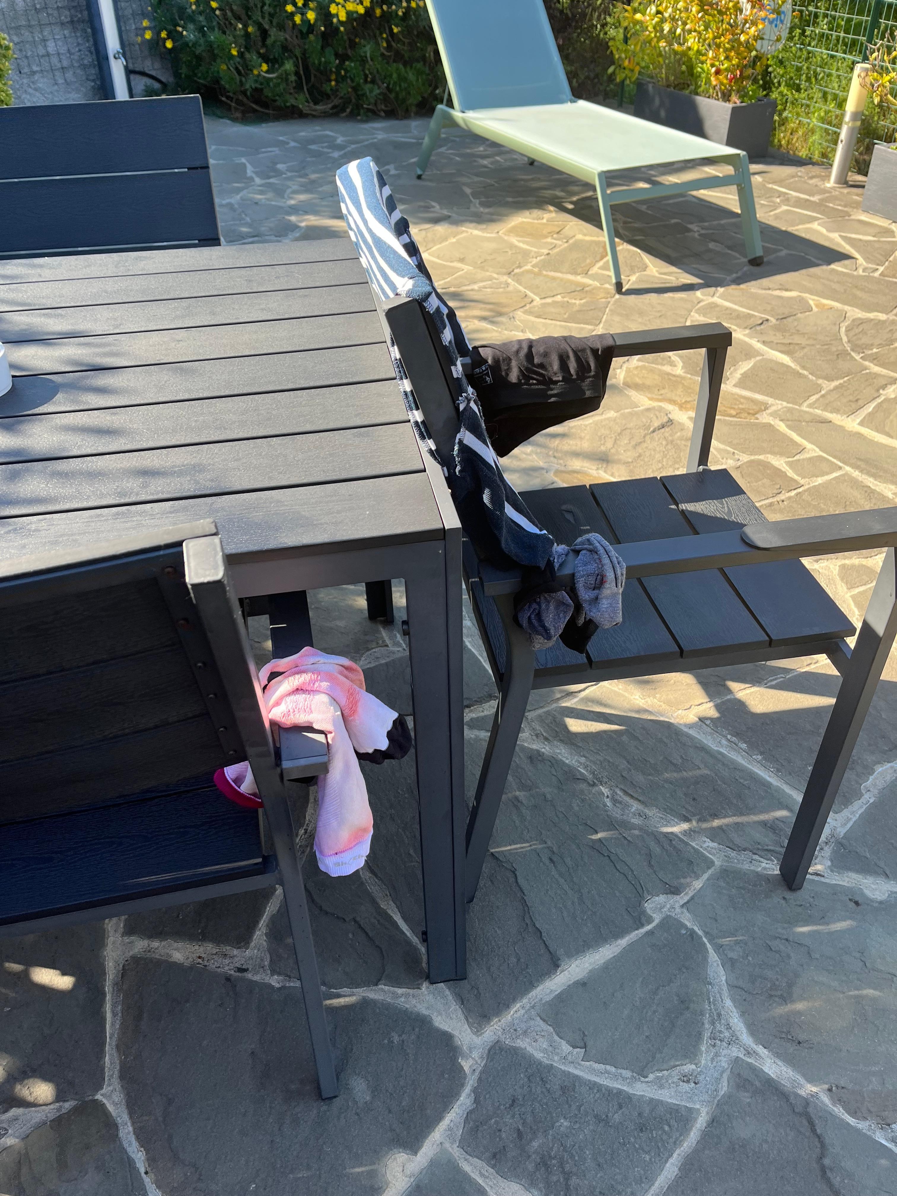 The only terrace off the upper room being used by guests to dry clothes.  