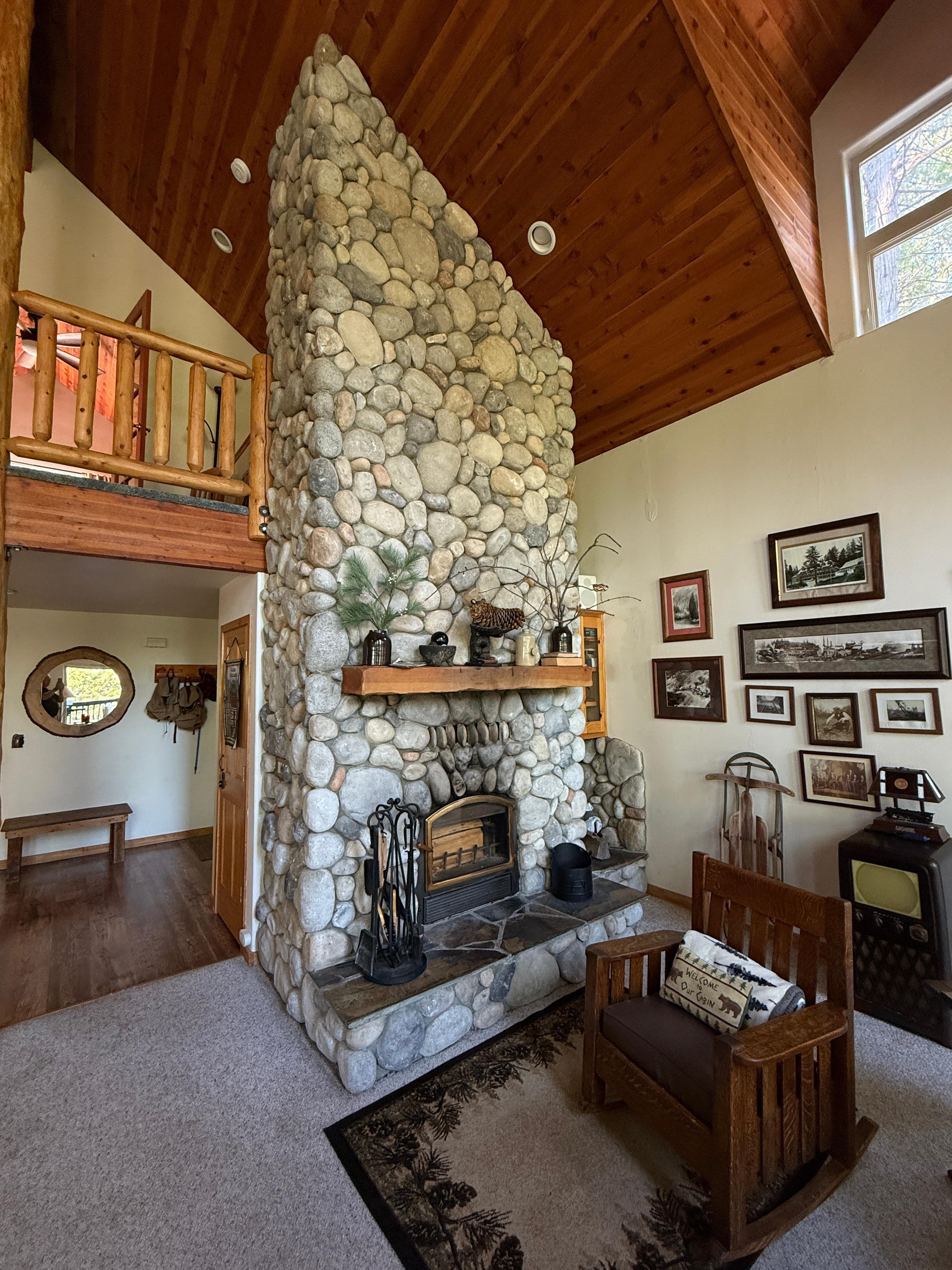 The stone-built fireplace adds warmth and charm.