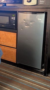 Dented refrigerator