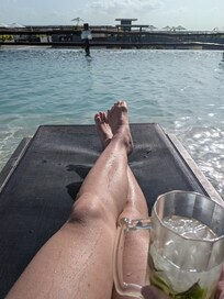 Relaxing at the rooftop pool