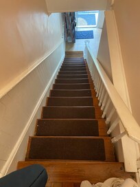 Wooden creaky and steep staircase