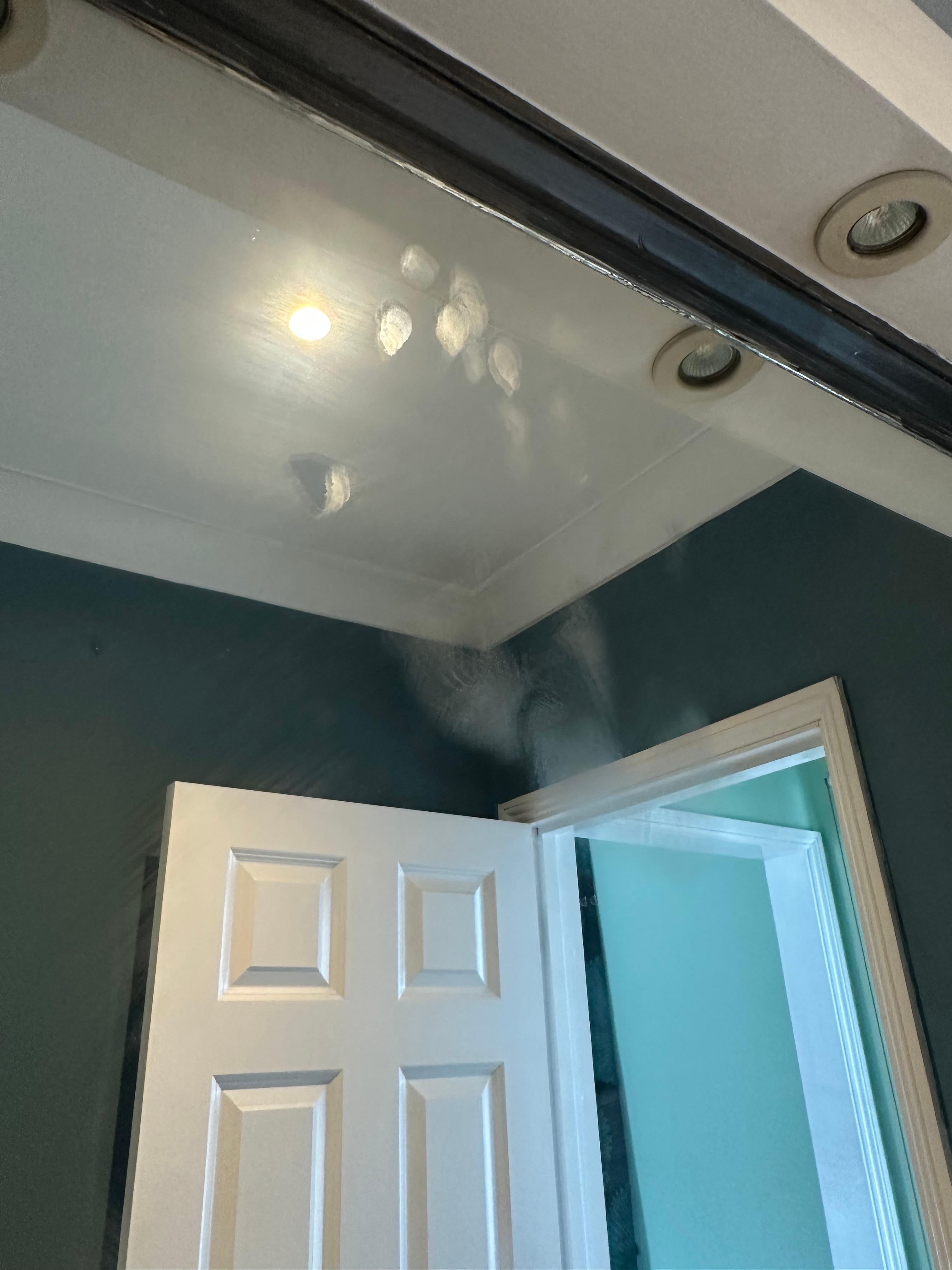 Hand prints on mirror