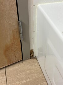 Disrepair in bathroom.