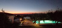 Sunset over mountains from the terrace.