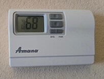 Showing the temp in the room versus 54 degrees in our house.