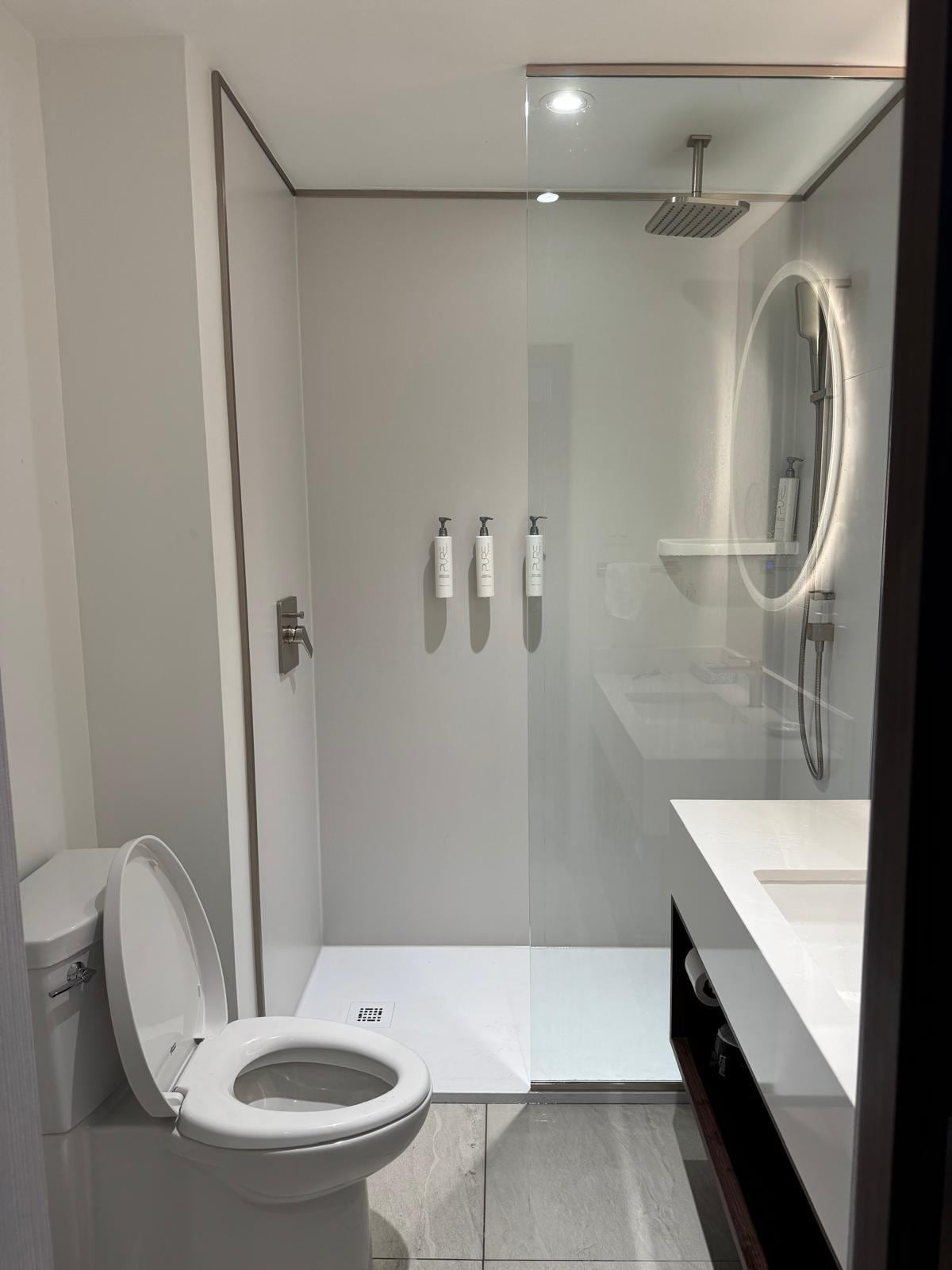 no door on shower area, which resulting all water to come out on floor while taking shower, danger to slip n fall.