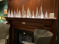 Beautiful holiday decoration in the lobby. Vermont craft glass fir trees.