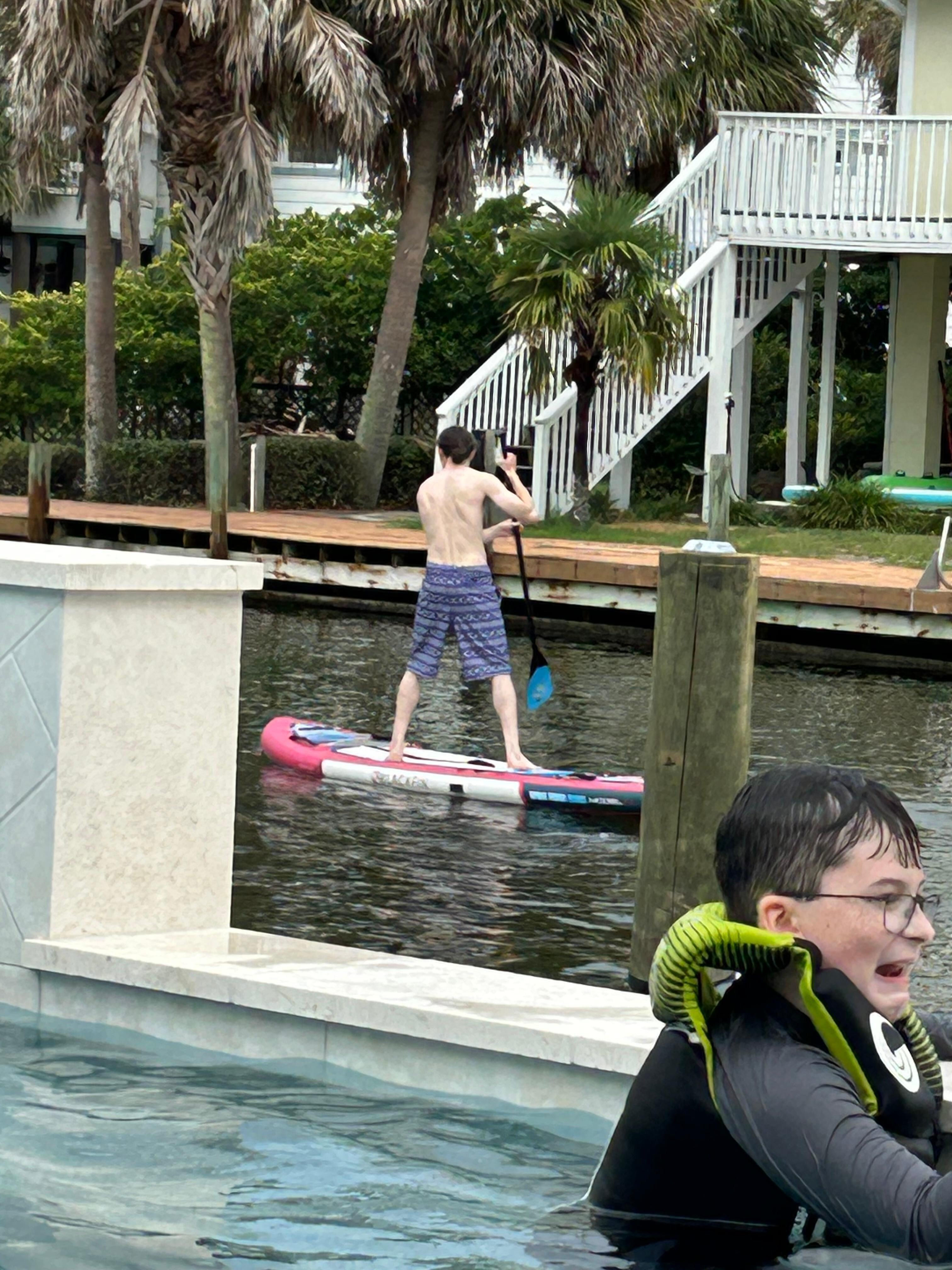 The younger adults tried out the boards and kayaks