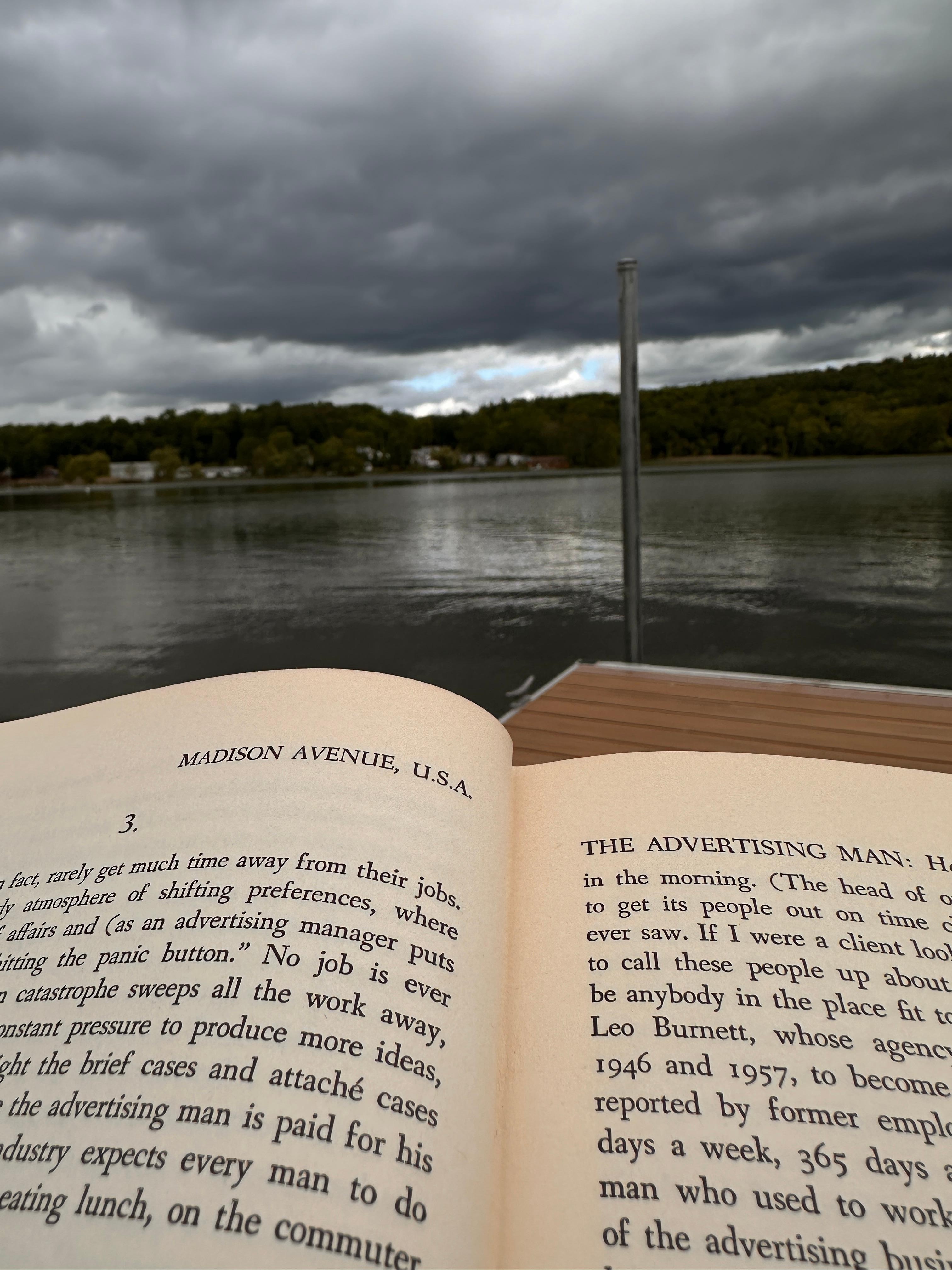 Sitting on the dock, reading just before the downpour.
