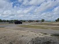 Faces the highway and frontage rd.