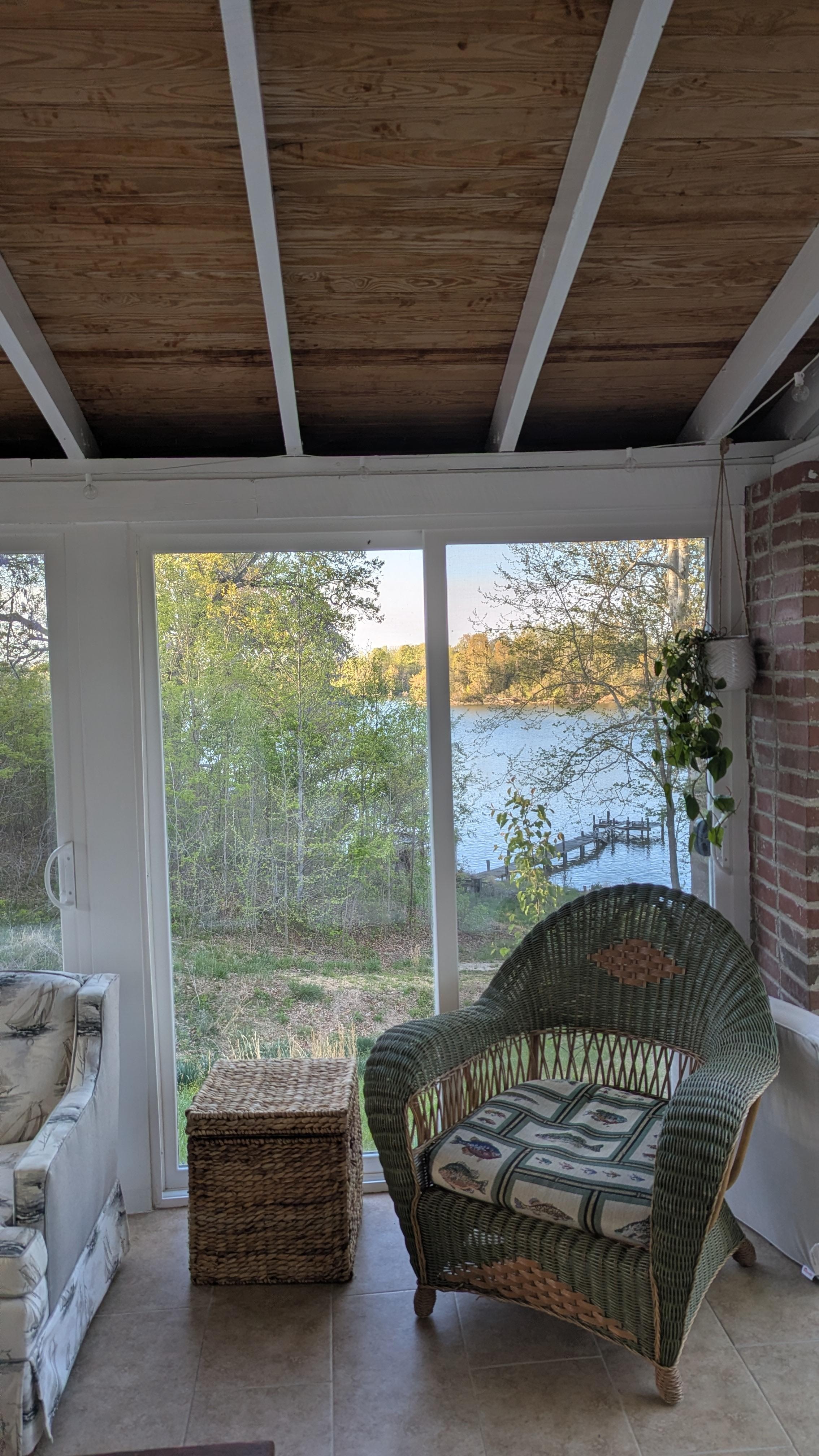 Closes in porch area over looking the river. Porch had all sorts of lawn games to ise