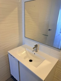 Only 2 towels were given. Theres no running hot water and you have to shower with flip flops on. The entire bathroom gets wet.