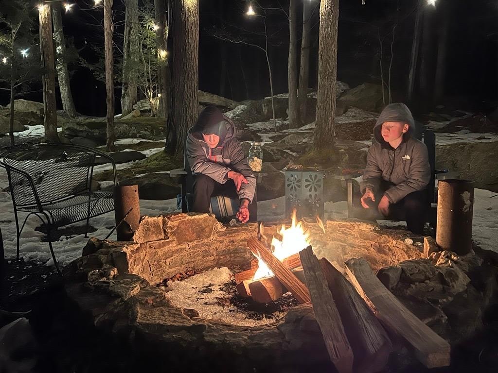 The boys appreciated roasting marshmallows.