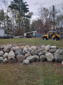 View of the property off the back patio next to the river